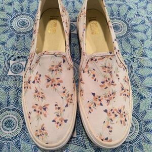 Keds floral slip on white shoes.